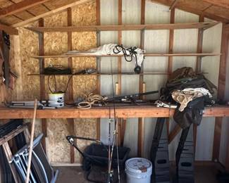 Assorted Fishing Rods and Garden Tools