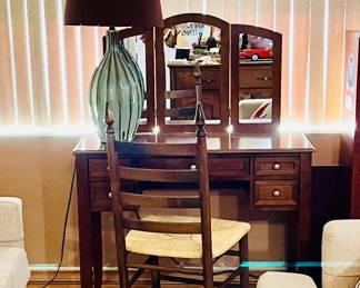 A vintage wooden tri-fold mirror vanity set, and vintage lamp