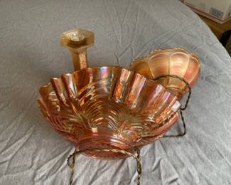 Marigold Carnival Glass, a popular style of iridescent pressed glass produced primarily in the United States during the early 20th century (