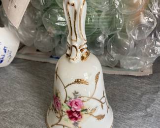 Vintage porcelain hand bell or dinner bell