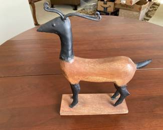 Vintage tribal-style animal sculpture