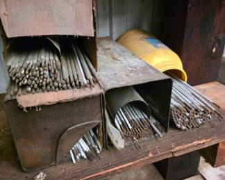 Welding Rods in Metal Storage Boxes