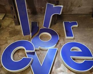 Blue And White Letters From Mobile Gas Station Sign