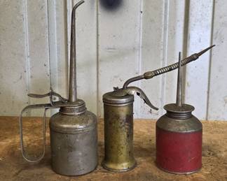 Three Metal Oil Cans