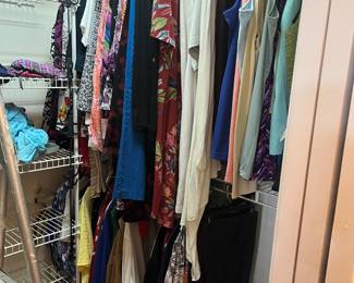 Lots of woman’s clothes. X-lg to 3x