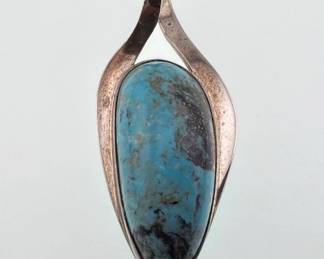 Sterling signed turquoise pendant