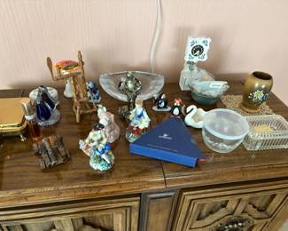 lalique crystal art piece, wooden clock, wooden vase, cigar butler (ashtray), various figurines