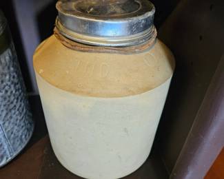 Cool antique clay canning jar. Complete with internals.