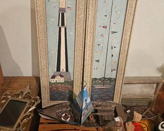 Boats and lighthouses. This is what remains of an entire room filled with nautical themed items. She didn't like to be on the ocean...the sea calls to us none-the-less