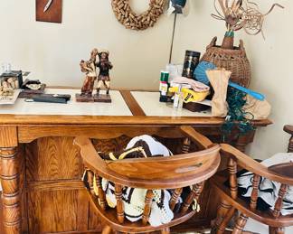 wood bar with captains chairs