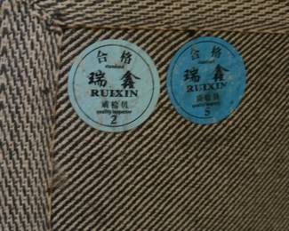 Ruixin Knotted Traditional Area Rug - 9’8” x 7’6”