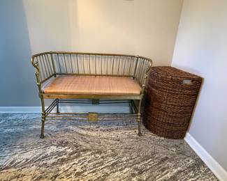 Very pretty brass bench with peach colored cushion
