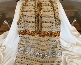 Lots of designer and vintage clothing--Haute Hippie, Ungaro, Marchesa, Ralph Lauren, Zara, Max Mara, BCBG, Harvey Nichol, Ted Baker, J. Crew, Michael Kors, plus lots fun vintage dresses, coats and furs