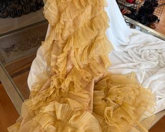 Lots of designer and vintage clothing--Haute Hippie, Ungaro, Marchesa, Ralph Lauren, Zara, Max Mara, BCBG, Harvey Nichol, Ted Baker, J. Crew, Michael Kors, plus lots fun vintage dresses, coats and furs