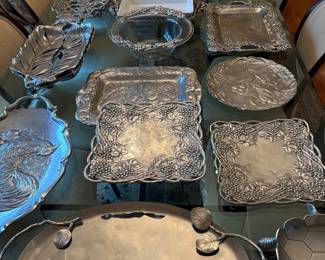 Lots of beautiful aluminum serving pieces from Arthur Court, Michael Aram, and Mariposa