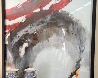 A large red and black abstract watercolor