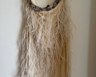 Lots of designer and vintage clothing--Haute Hippie, Ungaro, Marchesa, Ralph Lauren, Zara, Max Mara, BCBG, Harvey Nichol, Ted Baker, J. Crew, Michael Kors, plus lots fun vintage dresses, coats and furs