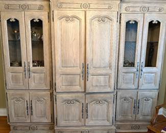 French country style display cabinet and armoire with a white washed finish