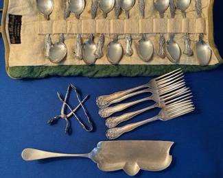Set of Sterling Silver spoons, forks and plated crumb knife.