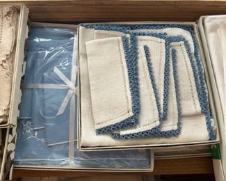 Large collection of linen tablecloths, napkins, etc. including lace, cutout, embroidered, linen, etc