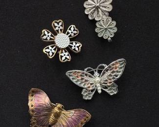 Vintage filigree brooches.