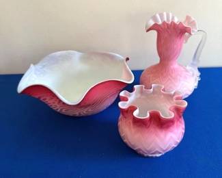 Fenton Art Glass ruffled edged and cranberry swirl.