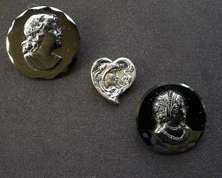 Antique Victorian-era mourning jewelry (black carved cameos) 