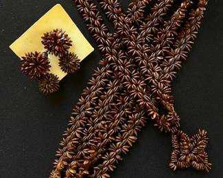 Vintage Hawaiian lei set, hand-strung brown apple or koa seeds.