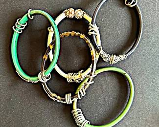 Vintage rigid arm bracelets.