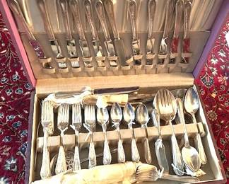 Rogers silver plate flatware set with box.