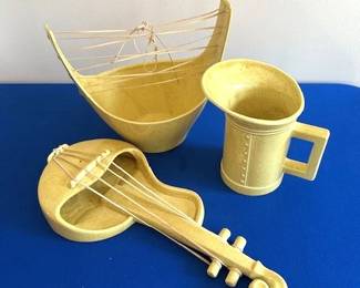 Vintage Redwing pottery pieces, including violin-shaped wall pocket planter.