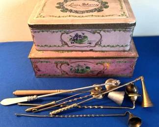 Vintage Louis Sherry New York tins and various metal candle snuffers.
