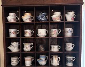 Antique shaving mugs and beautiful display rack.