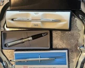 Collection of vintage writing instruments, including A>T>Cross and Parker.