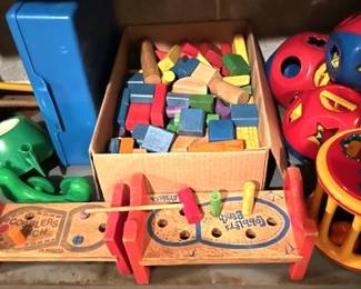 Vintage toys featuring wooden Playskool brand.