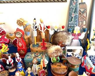 Large collection of traditional Swedish folk art, primarily Dala horses.