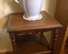 Vintage end table with antique ironstone pitcher.