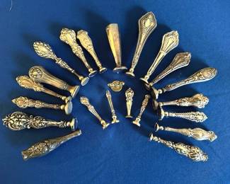 Victorian and Edwardian sterling silver button hooks.