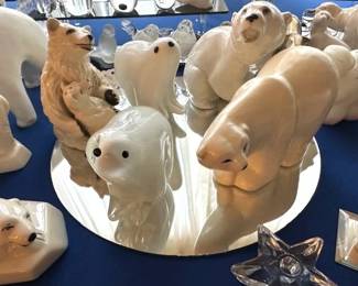 Collection of white polar bear figurines,  ceramic, porcelain, wooden & glass.