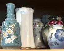 Antique hat pin vases.
