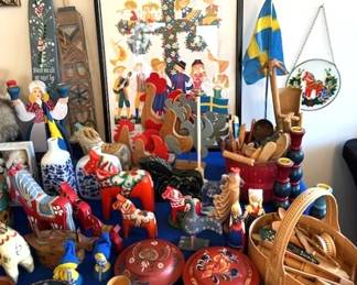 Large collection of traditional Swedish folk art, primarily Dala horses.