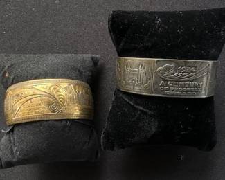 Antique 1933 Chicago World's Fair "Century of Progress" souvenir cuff bracelets.