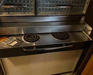 Vintage Fridgedair Flair Stove &oven.  Popularized by its appearance on the 1960s " Bewitched" show.  Cooktop slides out like a drawer.  