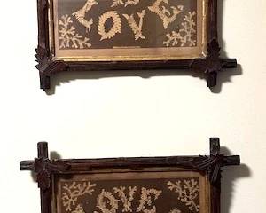 These are vintage Victorian-era paper punch embroidery motto pieces featuring religious phrases in carved wooden frames. 