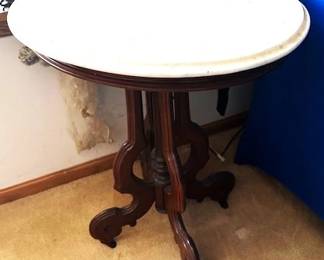 Victorian Eastlake style parlor table with marble top.