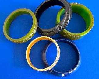 Vintage Bakelite bangle carved bracelets.