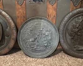Antique decorative wall plaques.