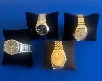 Men's Watches, back row:  Citizen, Seiko, front row: Omega and Seiko.