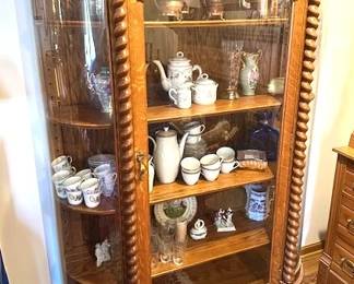 Antique oak china or curio display cabinet, dating around 1910.