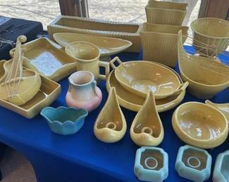 Collection of vintage yellow art pottery, including Weller, McCoy and primarily Red Wing.